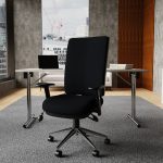 24 hour operators chair in black fabric in office