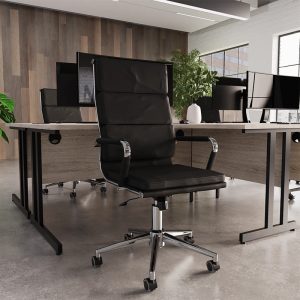 high back executive office chair in black leather in office