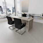 visitor chair in black leather and chrome cantilever frame at office desk