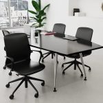 black high back office chair in vegan pu leather around a meeting table