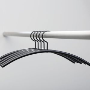 black coat hanger on rail