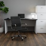contemporary home office chair in black leather in front of home office desk