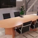 design classic meeting chair in black leather around a rounded end meeting table