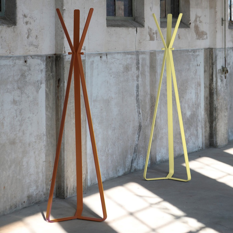 contemporary coat stand in brown and yellow outside