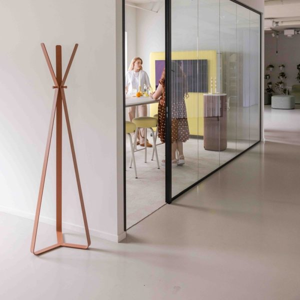 designer coat stand in brown in office