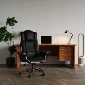 executive black leather office chair with gull wing arms in front of home office desk
