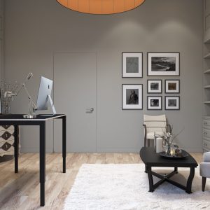height adjustable desk in black finish in room shot