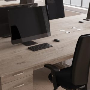 high back ergonomic operators chair in close up room shot with maple desks