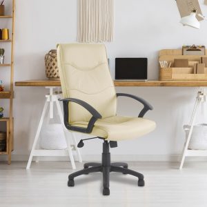 high back leather faced executive office chair cream in room shot with trestle style office desk