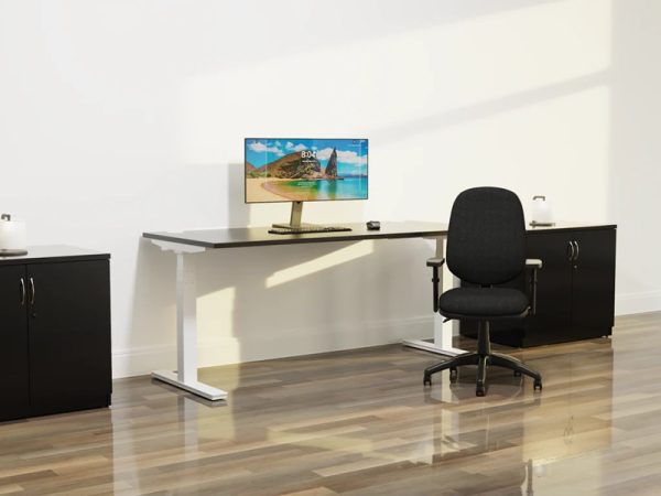 high gloss cupboard by office desk and black office chair