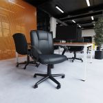 medium back office chair in black leather in office