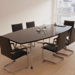 Cantilever visitor chair. black leather meeting chair around boardroom table roomshot