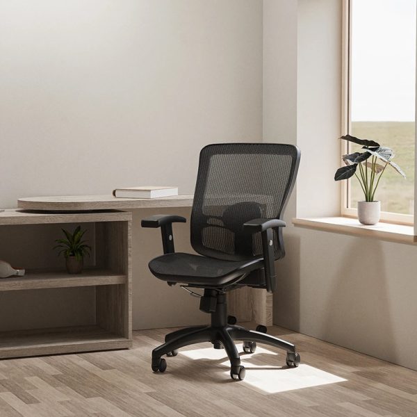 mesh office chair black in home office in front of office desk