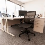 mesh office chair in office in front of office desk