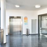 no touch office bin in reception by lift doors