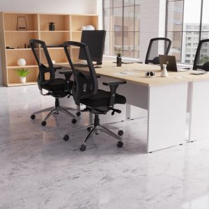 office bookcase roomshot with office desks and black office chairs