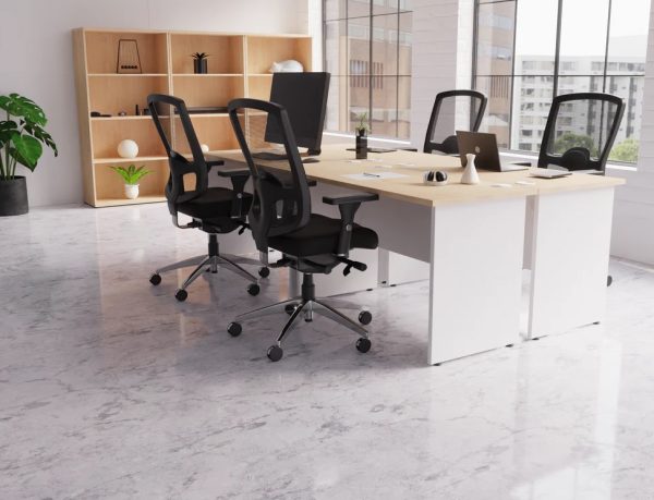 office bookcase roomshot with office desks and black office chairs