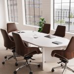 office chairs in brown pu round a meeting table