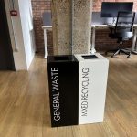 office recycling bins black and white with waste stream labelling.