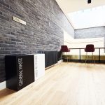 office recycling bins in seating area