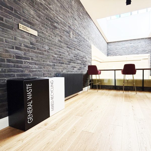 office recycling bins in seating area