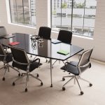 vegan leather office chairs around a meeting table in meeting room