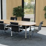 visitor chair black leather with cantilever frame around meeting table