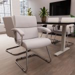 visitor chair in white leather and chrome cantilever frame in office
