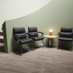 visitor chair in black leather with chrome cantilever frame in reception