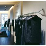 wall mounted chrome coat rail in shop