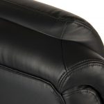 close up of heavy duty office chair in black leather