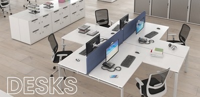 group of white office desks and screens with office chairs