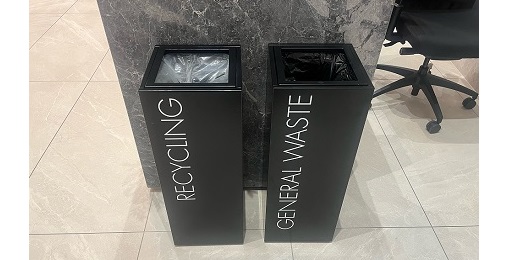 2 black office recycling bins with recycling and general waste white lettering