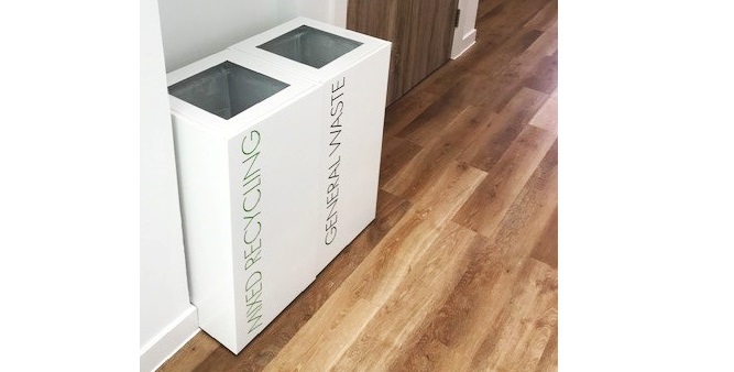 2 white office recycling bins with green mixed recycling lettering and black general waste lettering