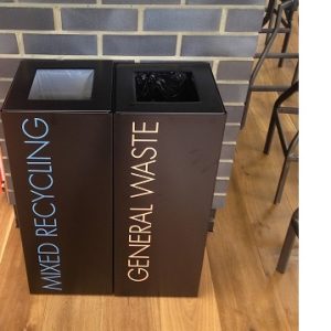 2 black square office recycling bins