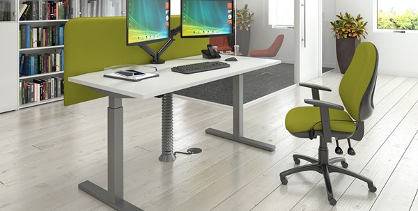 about us workspace designs page image with height adjustable desk and green desk screen and matching office chair