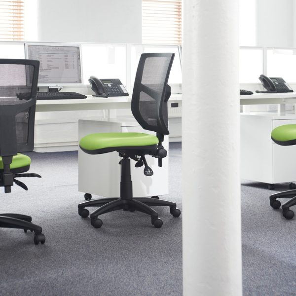 mesh back office chairs with lime green fabric seat by desk in office