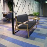 grey fabric sofa with wooden frame