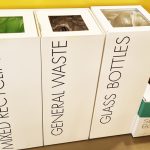 Bins for new waste management rules. white office recycling bins 3 in a row to separate waste streams