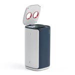 office recycling bin for metal with blue and grey body and red lid with 2 aperture. lid is shown open
