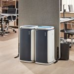 office recycling bin paper with blue top by a mixed waste bin in office set up