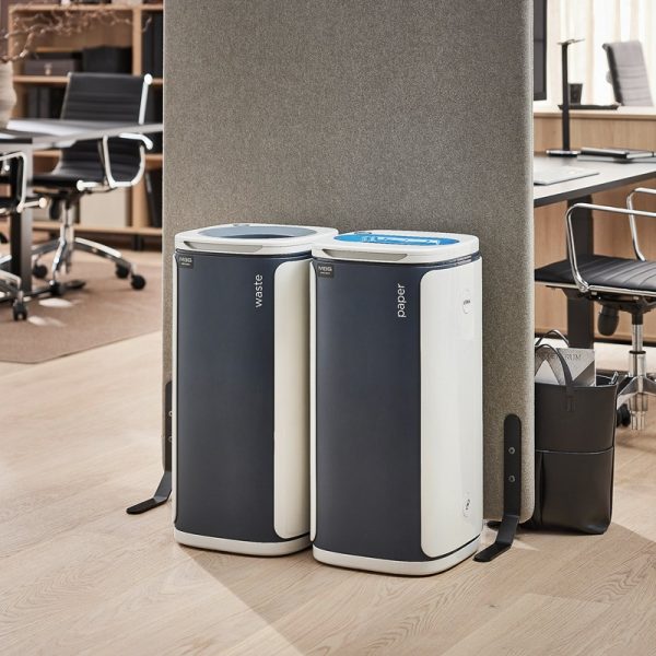 office recycling bin paper with blue top by a mixed waste bin in office set up