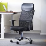 mesh back operators chair by office desk