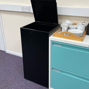 office recycling bin with hinged lid in office