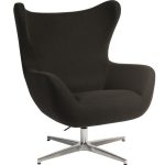 modern armchair in grey fabric in a reception by a coffee table
