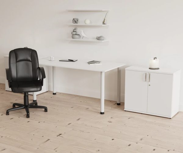 medium back executive office chair black in front of white home office desk and office cupboard