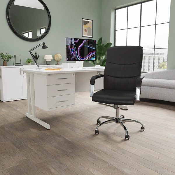 black executive office chair in home office in front of white office desk