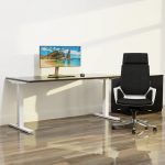 executive office chair in black fabric in front of office desk