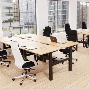 executive high back office chair in black fabric around office desks