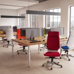 executive high back office chairs in colourful fabrics around office desks